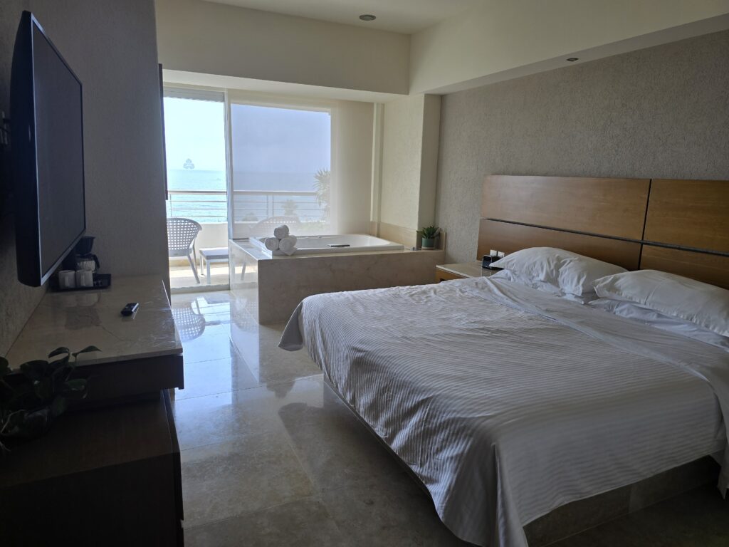 Bedroom with jacuzzi and balcony